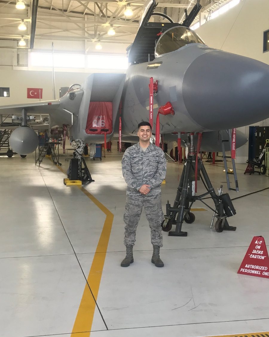 Andrew Amezquita in U.S. Air Force uniform in an aircraft hangar